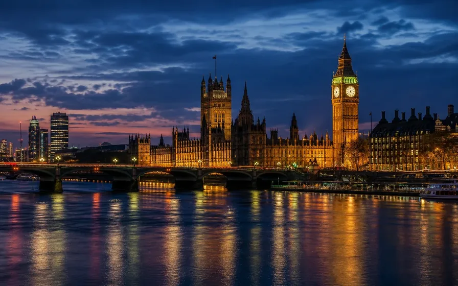 London skyline along the River Thames at blue hour